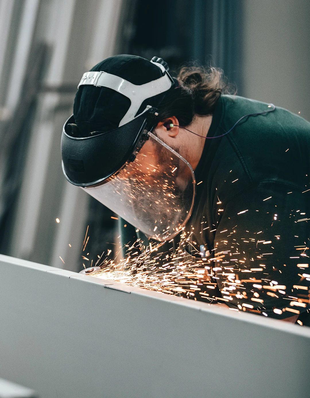 weigman-group-img4 man welding